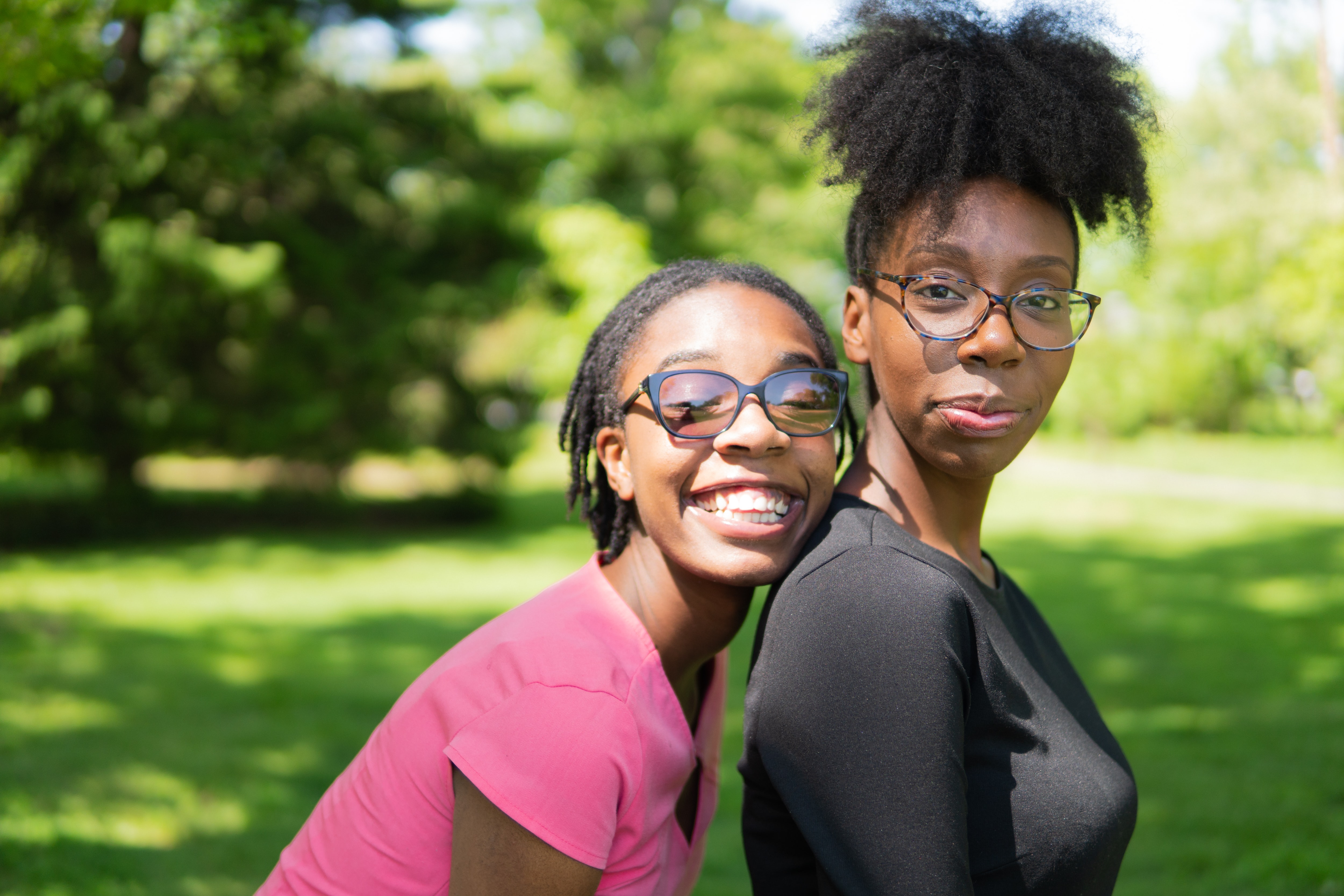 Two women smiling.